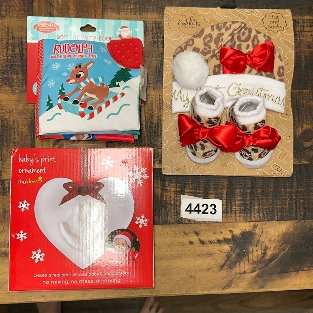 Baby essentials hat and socks. Rudolph book. Baby print ornament